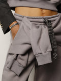 Pantalone con maniche applicate