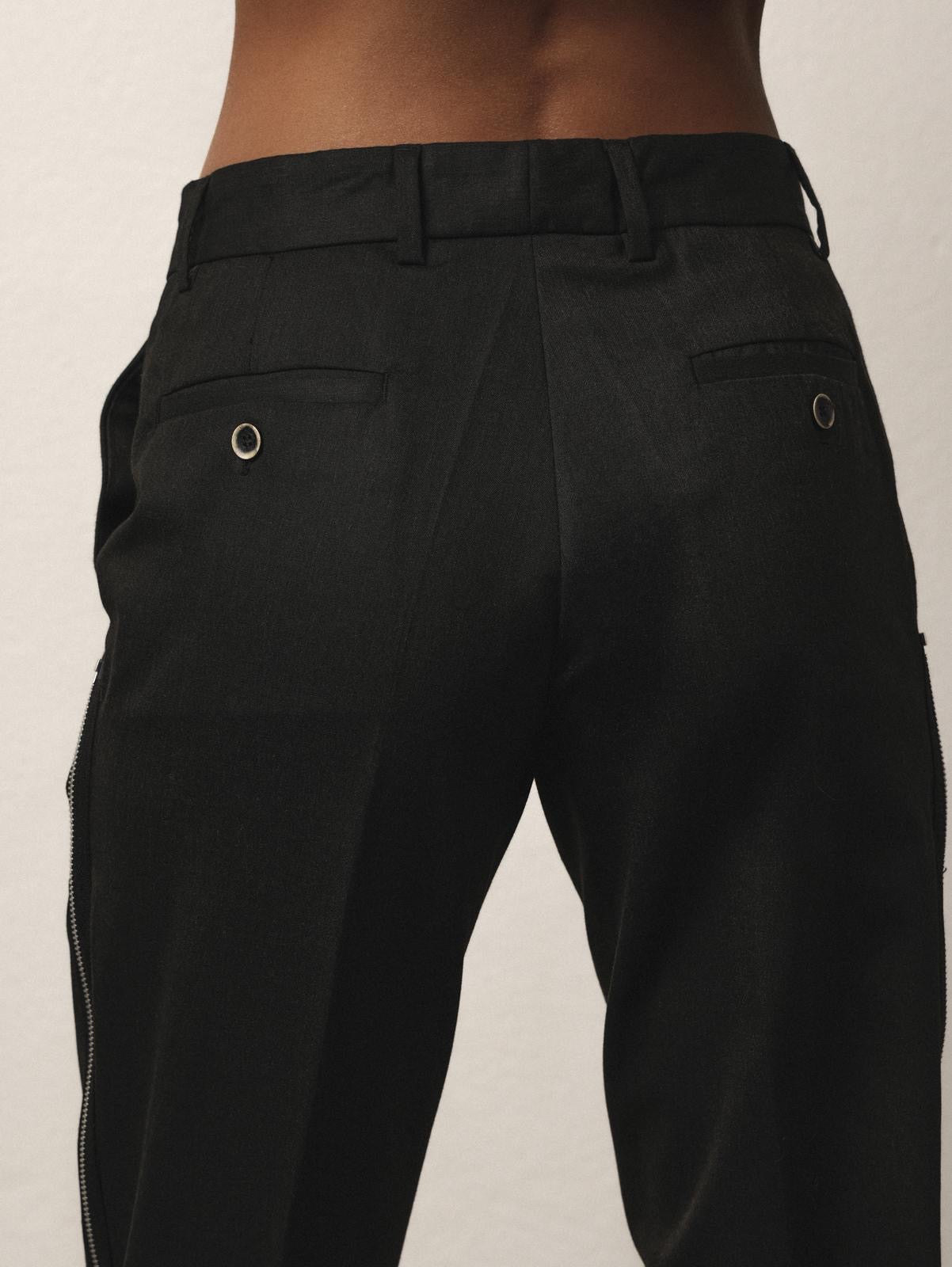 Pantaloni con zip laterali