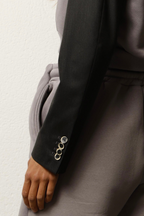 Felpa cropped con maniche giacca