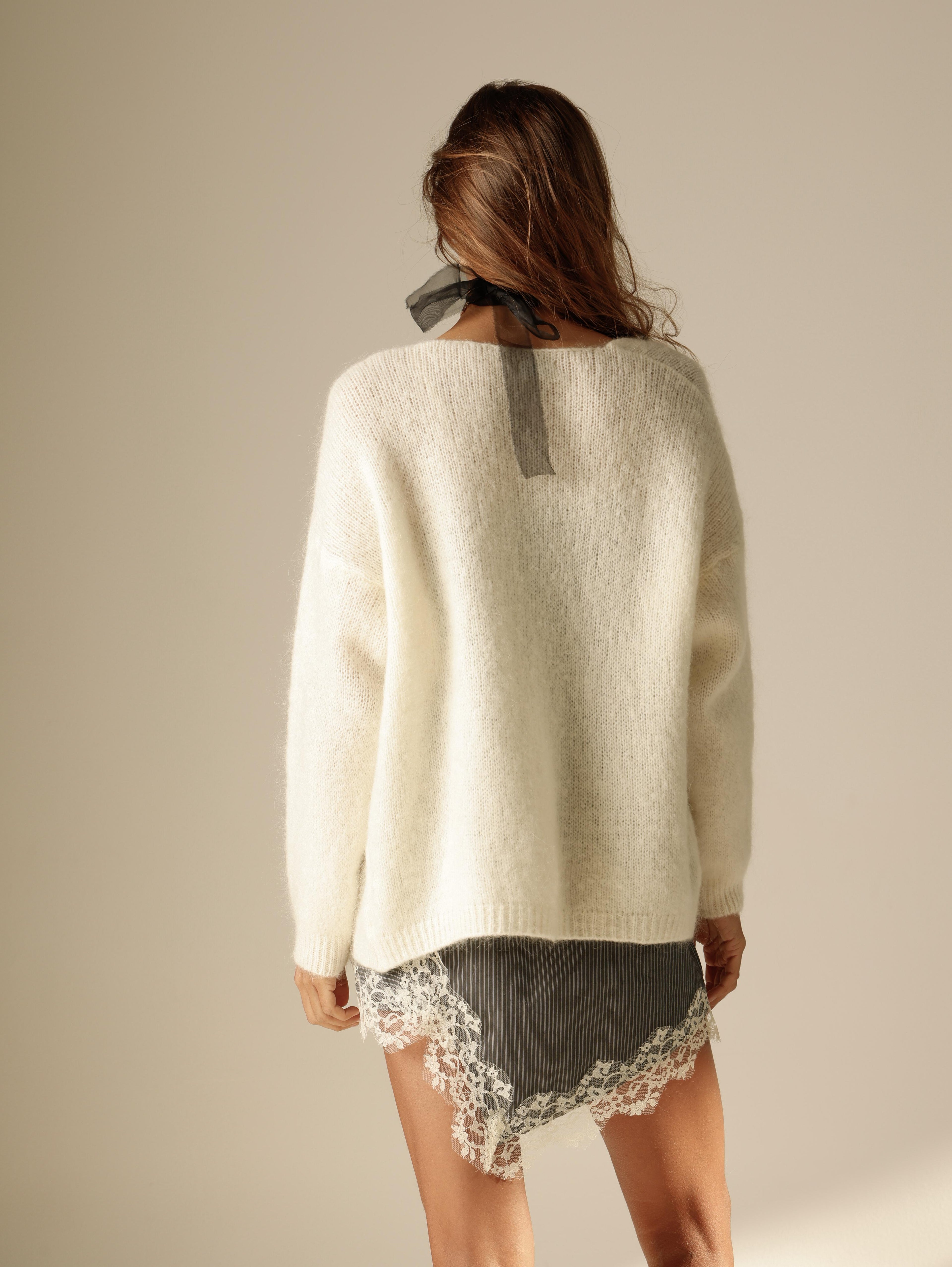 Cardigan in mohair con bottoni automatici